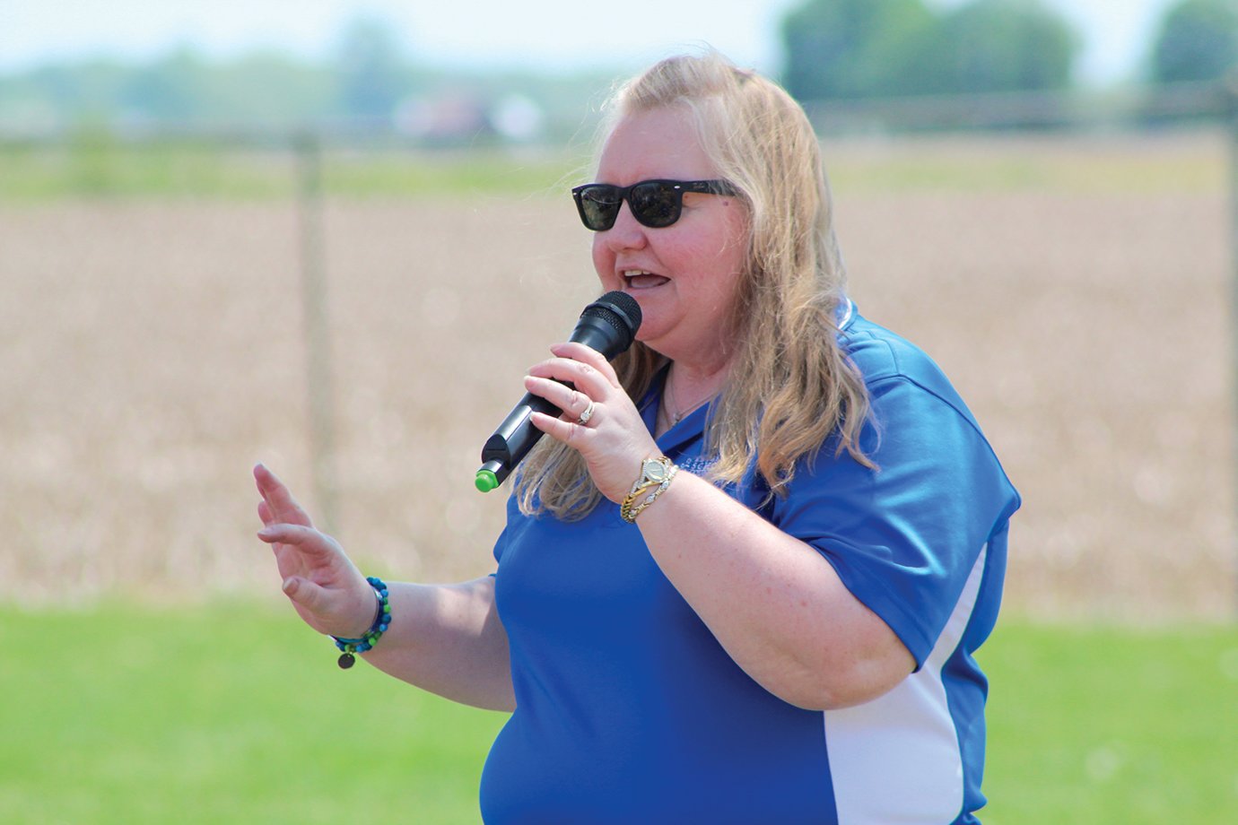 Walnut counselor Lenna Schroll tells the Walnut student body, staff, family and friends about her late son Parker Schroll, Friday during a dedication ceremony at Walnut Elementary.
